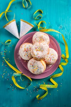 Carnival powdered sugar raised donuts - German Berliner donuts, Krapfen filled with jam