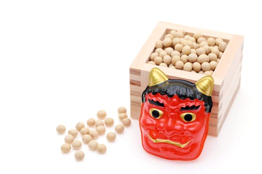 Japanese traditional Setsubun event, Soybeans and masks of oni demon and otafuku