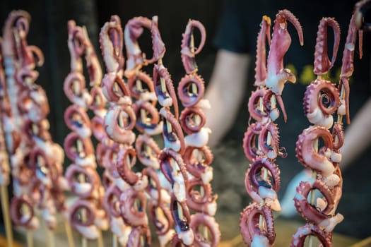 Baby octopus meat on wooden sticks, ready to be grilled on the street in the Muslim Quarter, Xian town, China