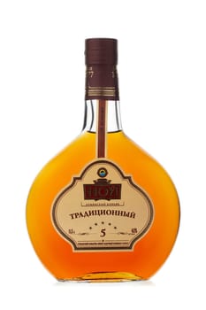 St.Petersburg, Russia - December 2019 - Bottle of NOY traditional Armenian cognac  isolated on white background. Five-year aging. Brand of ‎Yerevan Ararat Brandy Factory