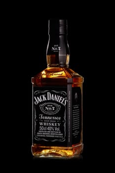 St.Petersburg, Russia - December 2019 - Bottle of Jack Daniel's whiskey on black background. Brand of the American whiskey
