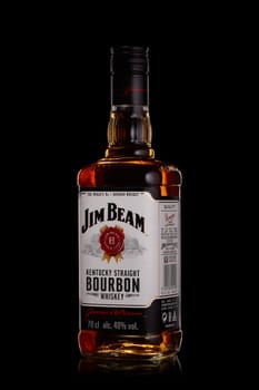 St.Petersburg, Russia - December 2019 - Bottle of Jim Beam bourbon whiskey on black background. Kentucky straight bourbon whiskey