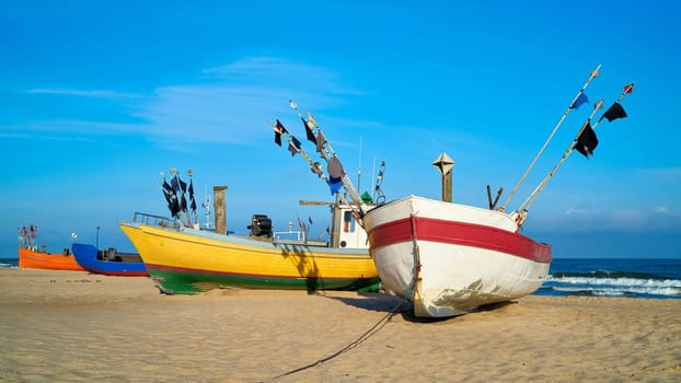 Fishing boat on the beach of the Polish Baltic coast near Rewal