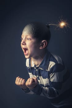 angry caucasian child with bomb shaped head about to explode. Concept of anger and uncontrolled emotions. Vertical format.