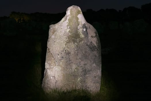 Menhir at night - Alignements du Menec  - rows of Menhirs - standing stones - the largest megalithic site in the world, Carnac, Brittany, France