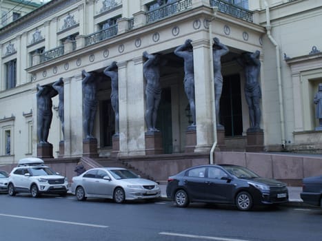 St. Petersburg, Russia, December 28, 2019, statue giants tall strong man Atlantes,  New Hermitage