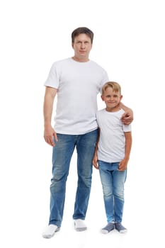 Friendly family. Young man with child stands isolated on a white background. Happy parent. Father with son. Concept of people and family