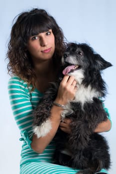 woman posing with her dog