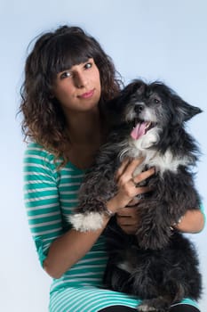 woman posing with her dog