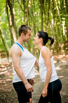 Sport couple together in nature having great time