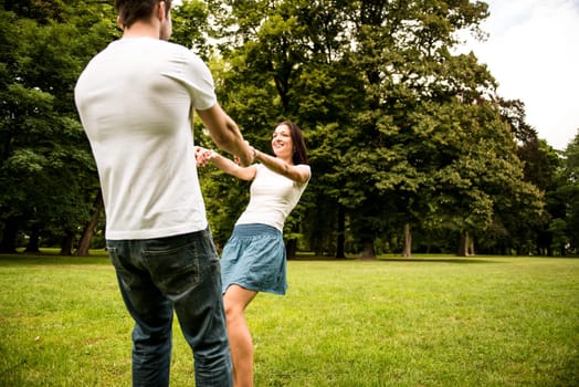 Young happy couple enjoying life together - outdoor youth lifestyle