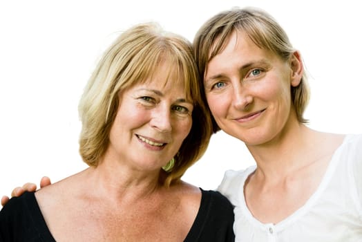 Portrait of happy senior mother with her adult daughter - isolated on white