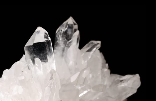 Quartz crystals on black background