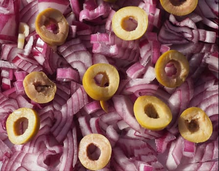 chopped red onions with olives