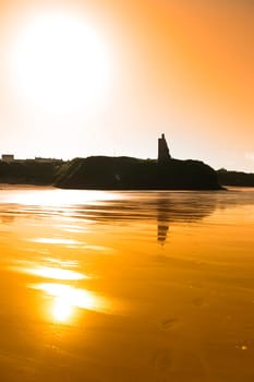 sunset view of the castle beach and cliffs in Ballybunion county Kerry Ireland