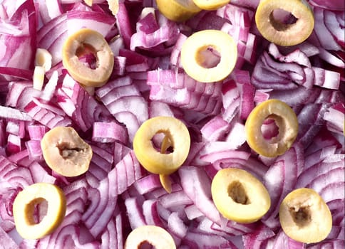 chopped red onions with olives