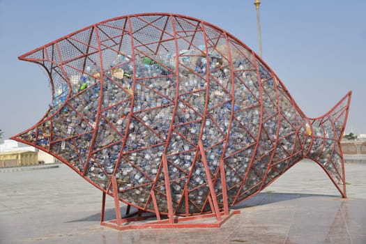 Fish eat the plastic waste in the oceans Food chain Microplastics in the oceans Protest action Environmental pollution Environment Sculpture Action