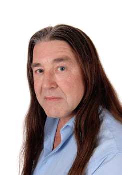 A handsome indigenous man looking serious in a portrait head shoot .with his long brunette hair, isolated for white background.