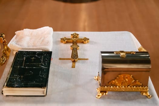 Church Baptism SuppliesChurch supplies priest for baptism on the table