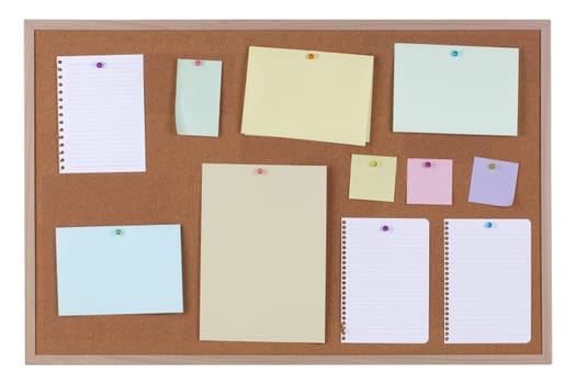 Paper reminder notices on a cork notice board on white background with clipping path