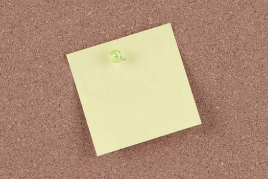 A post note on cork notice board