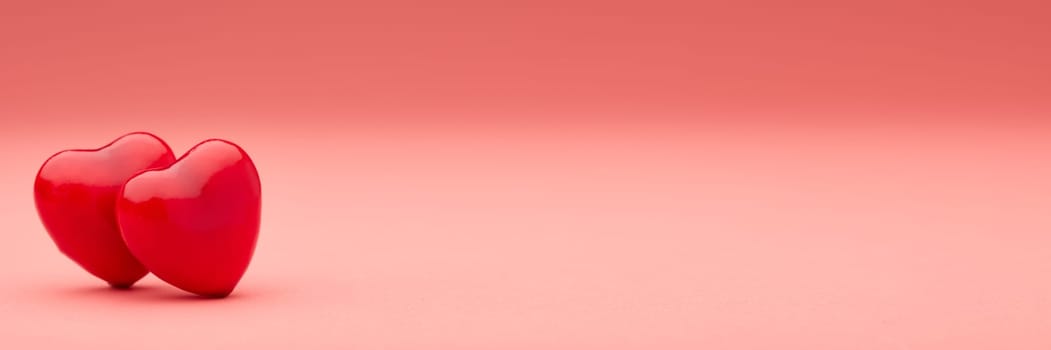 Two decorative hearts on pink background with copy space. Valentine's Day. Wedding Day. Design element for romantic greeting card,  invitation.