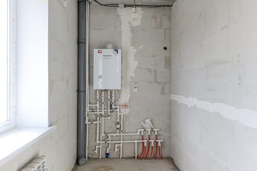Russia, Moscow- September 10, 2019: interior room rough repair for self-finishing. interior decoration, bare walls of the room, stage of construction