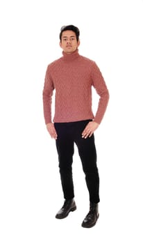 A tall skinny young man in black jeans and a burgundy sweater.standing with his thump in his pocked, isolated for white background.