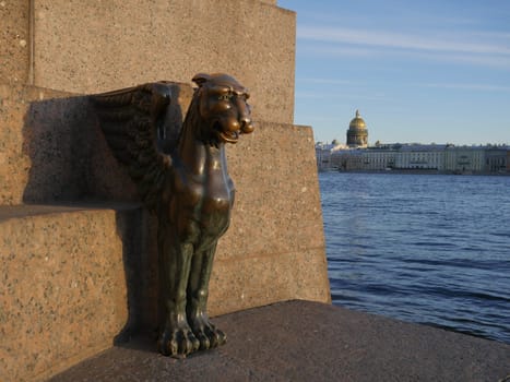 Winged lion bronze sculpture on the promenade in St. Petersburg