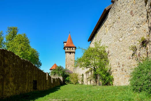 View of a tower of the old church castle in Ostheim, Rhoen, Bavaria, the largest of its kind in Germany