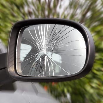Closeup of broken rearview mirror