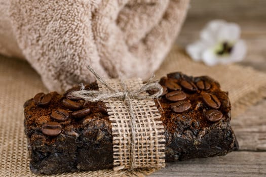 Handmade soap with natural fillers, with ground coffee, with jute decoration