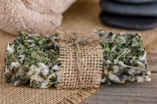 Handmade soap with natural fillers, with dry mint, with jute decoration