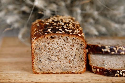whole wheat gluten free bread with flax seads sunflower chia seads sesame. side view with copy space