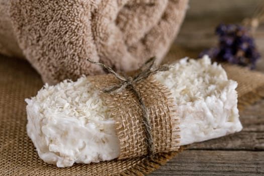Handmade soap with natural fillers, with coconut flakes with jute decoration