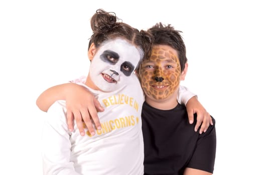 Children with animal face-paint isolated in white