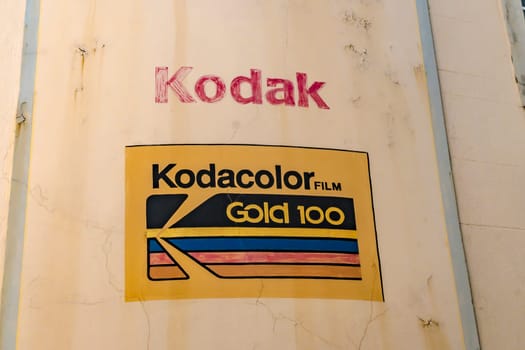 BERNKASTEL-KUES, RHINELAND-PALATINATE, GERMANY – SEPTEMBER 10 2019: Old weathered Kodak Logo on a house facade