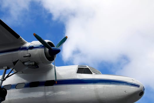 Holiday trip with a plane above the clouds