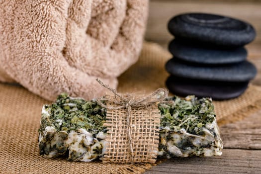 Handmade soap with natural fillers, with dry mint, with jute decoration