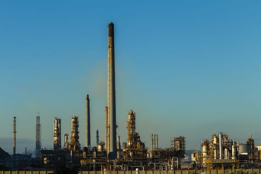 Refinery factory structures in morning light
