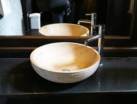 Beautiful washbasin in the bathroom photographed closeup