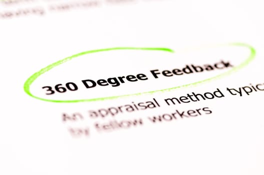 Words 360 Degree Feedback highlighted with green on white paper, copy space available, Business Vision Concept