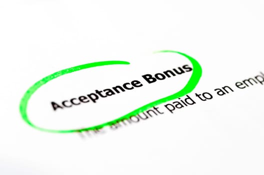 Words cceptance Bonus highlighted with green on white paper, copy space available, Business Vision Concept