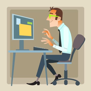 The man in the office working on the computer. The Internet and social networking