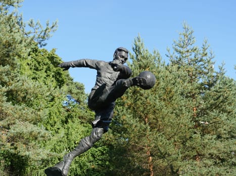 St. Petersburg, Russia, August 27, 2019 Monument famous footballer Vsevolod Bobrov,  football forward with the ball
