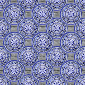 Seamless background from a set of decorative ceramic dishes hand-painted with acrylic paints with a floral pattern.