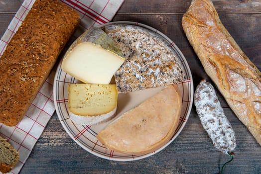 cheeses, sausage and Tomme de Savoie, Savoy, the french Alps France.