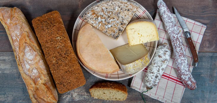 cheeses, sausage and Tomme de Savoie, Savoy, the french Alps France.