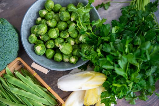 sprouts and endives on a wooden background, Belgian vegetables