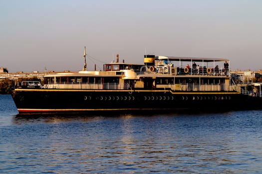 A boat sailing on Dnipro river in Dnipro city, Ukraine. The photo taken on 13.10.19